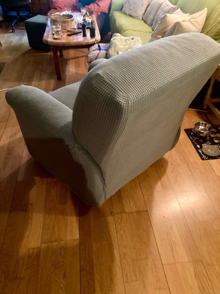 Sillón reclinable gris tela