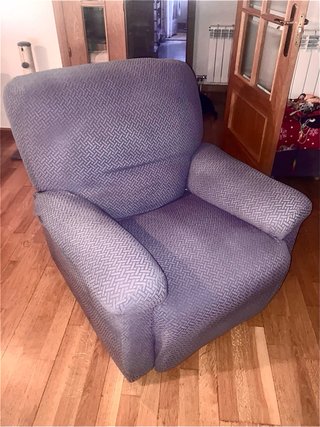 Sillón reclinable gris tela