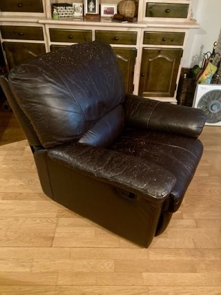 Sillón reclinable gris tela