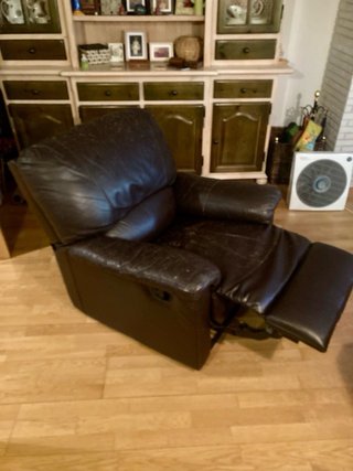 Sillón reclinable gris tela