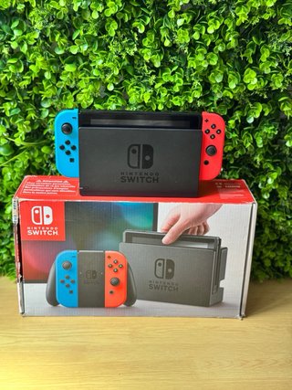 COMO NUEVA Nintendo Switch en su caja + Accesorios