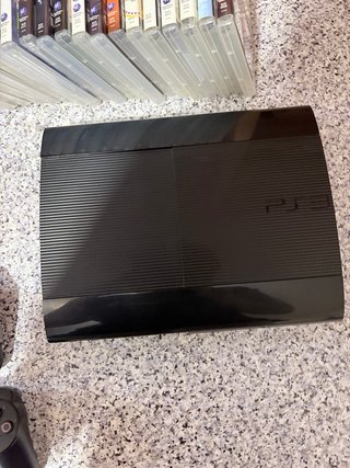 Consola PS3 + 6 Mandos + 2 Micrófonos + 22 Juegos