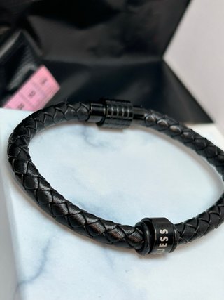 Pulsera Guess trenzada negra