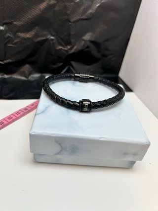 Pulsera Guess trenzada negra