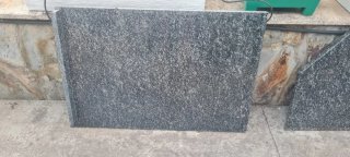 Encimera de granito, fregadero y grifo