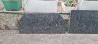 Encimera de granito, fregadero y grifo
