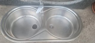 Encimera de granito, fregadero y grifo