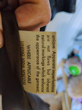 Gabardina de piel marrón inglesa