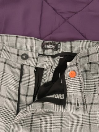 Pantalón de pinzas gris a cuadros