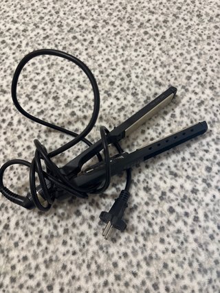 Plancha de pelo negra