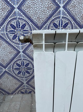 Radiador blanco de 4 elementos