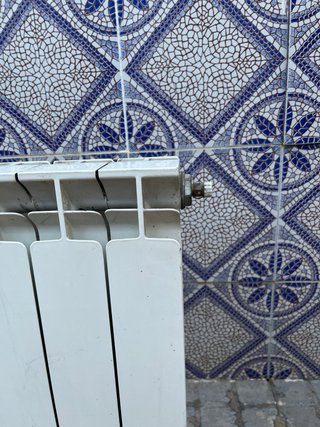 Radiador blanco de 4 elementos