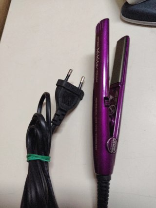 Plancha de pelo Nikki viaje morado