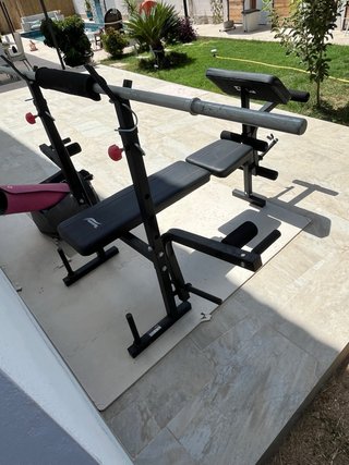 Banco de musculación multifunción y barra