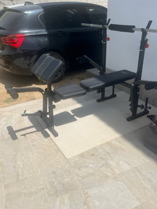 Banco de musculación multifunción y barra