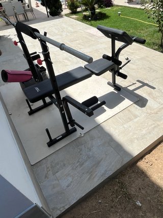 Banco de musculación multifunción y barra