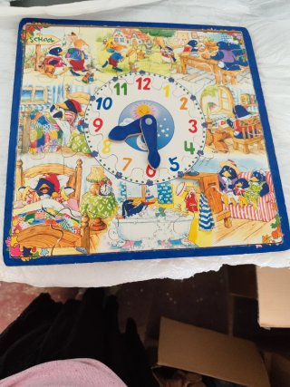Puzzle orologio in legno con pinguini