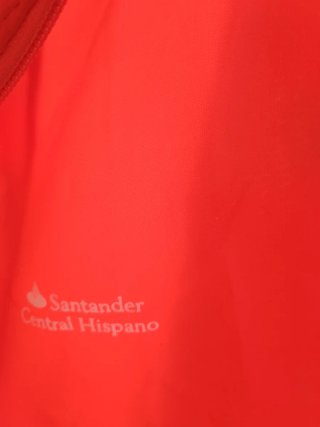 Chubasquero rojo sin estrenar