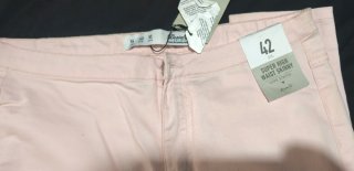 Pantalones pitillo marrones y rosas. Talla 48 y 42