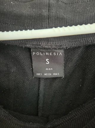 Pantalón chándal negro y naranja