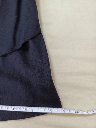Top negro elegante capas volantes