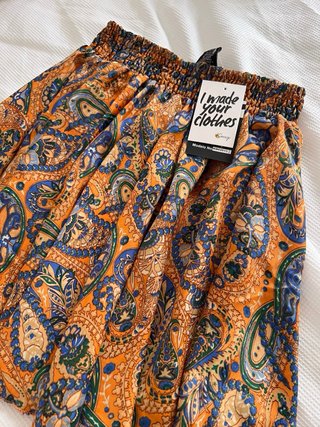 Minifalda de seda naranja estampado