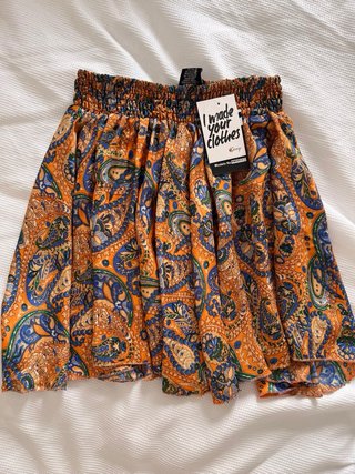 Minifalda de seda naranja estampado