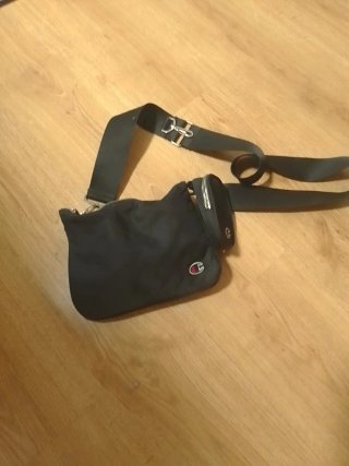 Bolso Champion negro con neceser