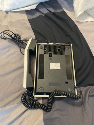 Teléfono fijo clásico beige