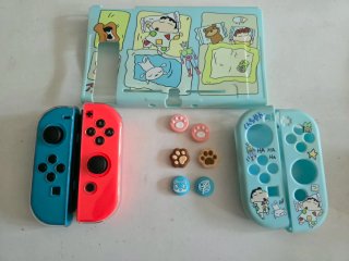 Nintendo Switch V1 con mandos y accesorios