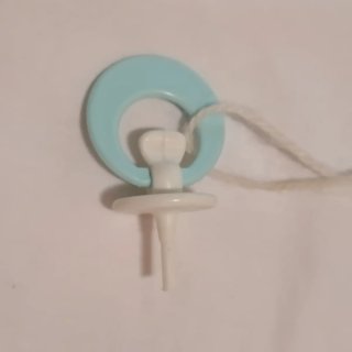 Chupete antiguo de muñeco