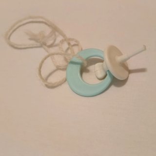 Chupete antiguo de muñeco