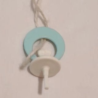Chupete antiguo de muñeco