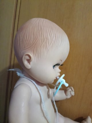 Chupete antiguo de muñeco