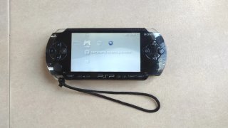 Sony PSP-1004 Nero + 13 Giochi