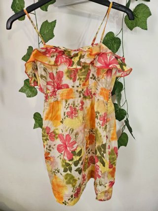 Blusa floral con volantes