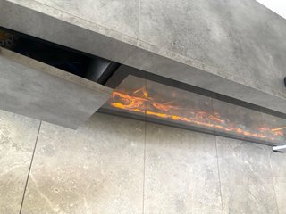 Elegante Mueble con chimenea decorativa