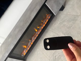Elegante Mueble con chimenea decorativa