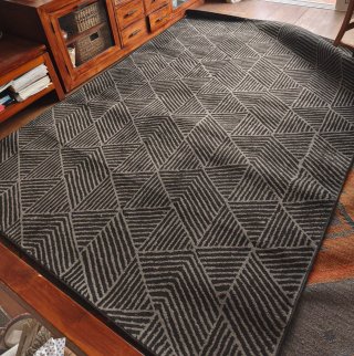 Alfombra geométrica beige y gris