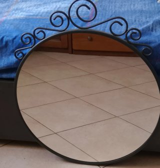 Specchio ovale in ferro battuto