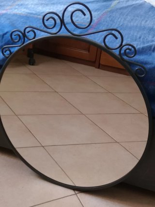 Specchio ovale in ferro battuto