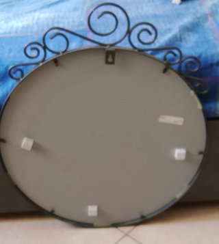 Specchio ovale in ferro battuto