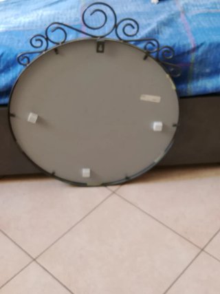 Specchio ovale in ferro battuto