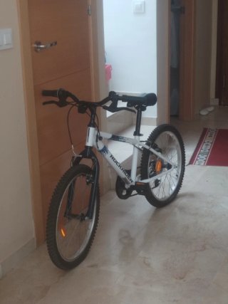 Bicicleta infantil Rockrider casi nueva