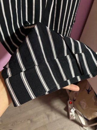 Pantalón negro rayas blancas