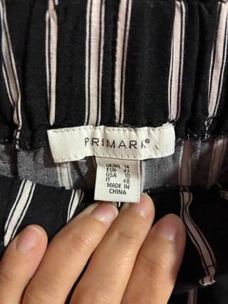 Pantalón negro rayas blancas