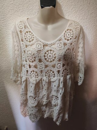 Blusa de encaje blanco