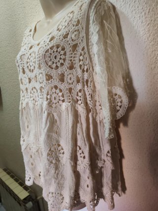 Blusa de encaje blanco
