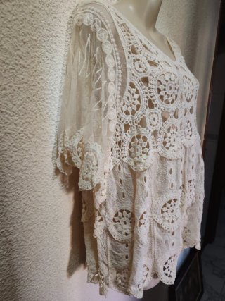 Blusa de encaje blanco