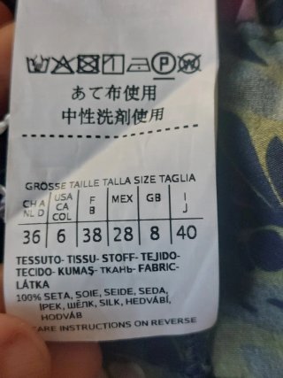 Pantaloni in seta fantasia floreale